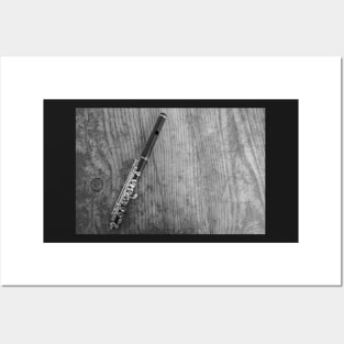 Top down view of wooden flute on wooden table Posters and Art